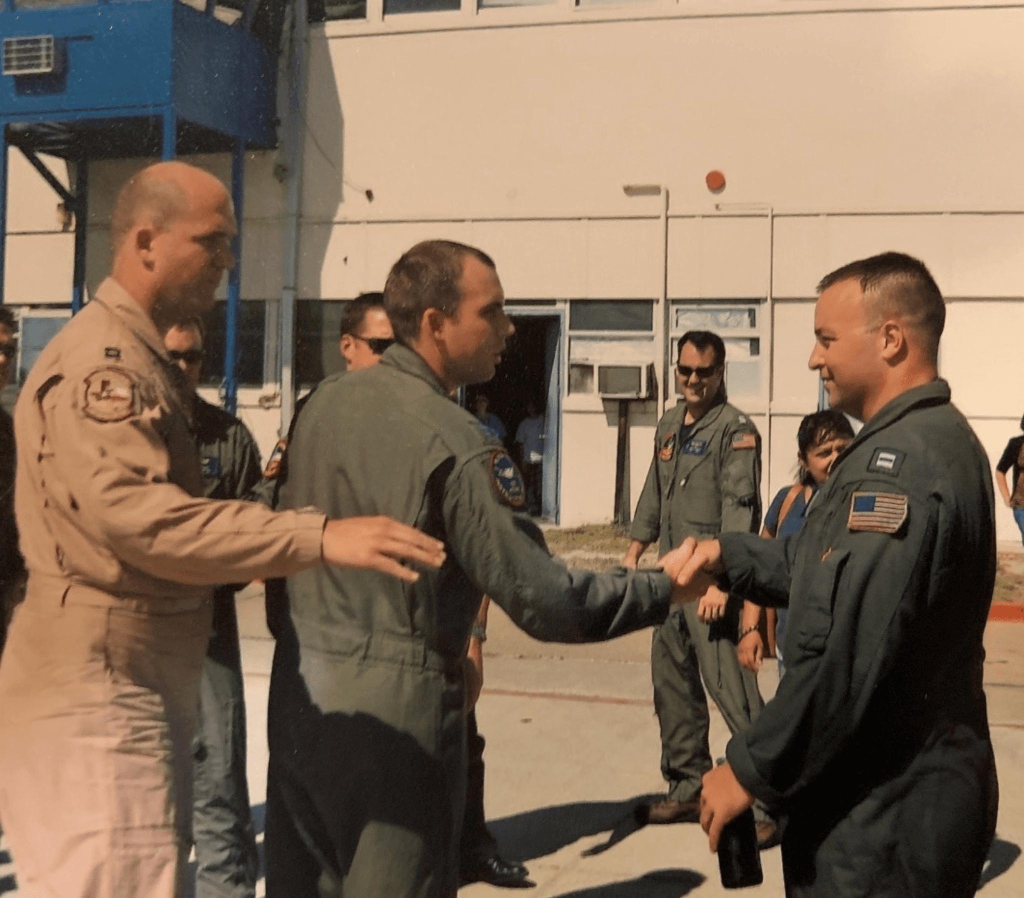 Bill greeting and connecting in a leadership setting that reflects the summit's real-world tone.